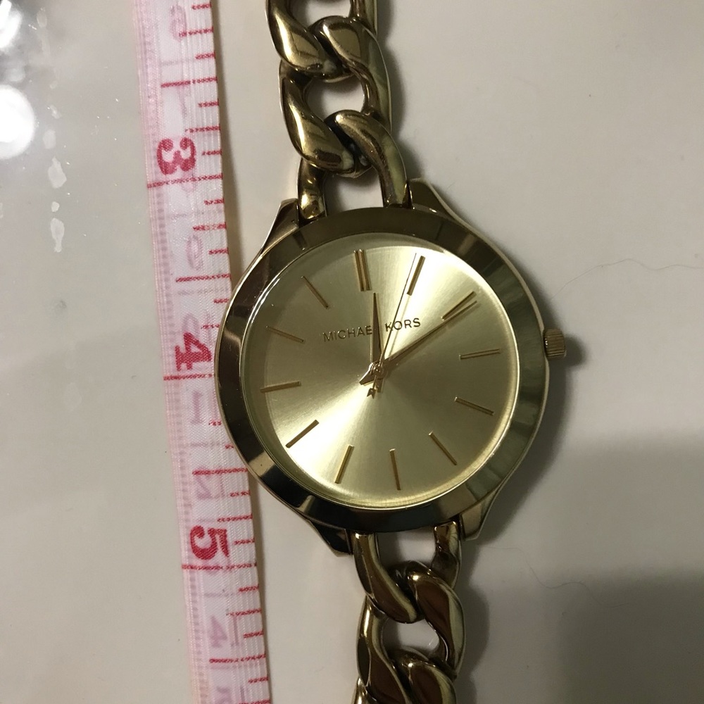 Michael Kors gold curb chain watch